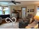 Cozy living room with neutral tones, comfortable seating, and natural light at 3030 N 600 E, Lebanon, IN 46052
