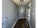Hallway with wood floors and gray walls at 3046 Central Ave, Indianapolis, IN 46205