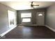 Spacious living room with wood flooring, white trim, and lots of natural light at 3046 Central Ave, Indianapolis, IN 46205