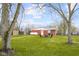 Green backyard with a fire pit and seating, perfect for outdoor gatherings at 3104 S Pisgah Way, Columbus, IN 47203