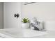 Bathroom close-up on white vanity and faucet with crystal knob at 3104 S Pisgah Way, Columbus, IN 47203