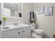 Bright bathroom with modern vanity, mirrored cabinet and coordinated decor at 3104 S Pisgah Way, Columbus, IN 47203