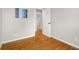 Bright room with hardwood floors and doorway to another room at 3104 S Pisgah Way, Columbus, IN 47203