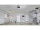 Spacious garage with white walls, concrete floor, and appliances at 3104 S Pisgah Way, Columbus, IN 47203