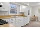 Kitchen boasts white cabinets, wood countertops, and stainless steel appliances at 3104 S Pisgah Way, Columbus, IN 47203