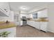 Functional kitchen with white cabinets, wood countertops, and stainless steel appliances at 3104 S Pisgah Way, Columbus, IN 47203