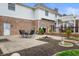 Spacious backyard features a patio, a fire pit, a deck, and beautiful landscaping at 325 W Greyhound Pass, Carmel, IN 46032