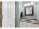 Stylish half bathroom features a sleek vanity, framed mirror, and neutral color palette at 325 W Greyhound Pass, Carmel, IN 46032