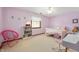 Pink painted bedroom with white furniture and carpet floors at 325 W Greyhound Pass, Carmel, IN 46032