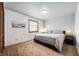Neutral bedroom with patterned rug, cozy carpet floors and white walls at 325 W Greyhound Pass, Carmel, IN 46032