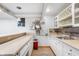 Entertain in style with this home wet bar featuring sleek countertops and open wine storage at 325 W Greyhound Pass, Carmel, IN 46032
