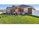The patio area includes a spa, a pergola with dining area, and a lounge space at 3254 S Ansley Dr, New Palestine, IN 46163