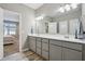 Bright bathroom featuring a double vanity with modern fixtures and neutral color palette at 3254 S Ansley Dr, New Palestine, IN 46163