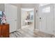 Welcoming entryway featuring a home office view and stylish flooring at 3254 S Ansley Dr, New Palestine, IN 46163