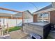 Backyard hot tub with wood frame and privacy fence offers a relaxing outdoor space at 3254 S Ansley Dr, New Palestine, IN 46163