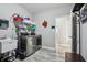 Well-organized laundry room with modern washer and dryer, utility sink, and organized shelving at 3254 S Ansley Dr, New Palestine, IN 46163