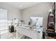 Office featuring a white desk, laminate flooring, and a rolling chair at 3254 S Ansley Dr, New Palestine, IN 46163