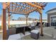 Outdoor patio features wooden pergola with outdoor furniture at 3254 S Ansley Dr, New Palestine, IN 46163