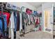 Bright walk-in closet features ample shelving and hanging storage space at 3254 S Ansley Dr, New Palestine, IN 46163
