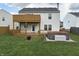 Expansive backyard features a deck, hot tub, and lush lawn, perfect for outdoor entertaining and relaxation at 373 Springfield Cir, Greenwood, IN 46143