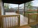 Spacious wooden deck with a hot tub and privacy fence, perfect for outdoor entertaining at 373 Springfield Cir, Greenwood, IN 46143