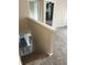Carpeted staircase leading to the upper level, offering a glimpse of the open layout below at 373 Springfield Cir, Greenwood, IN 46143