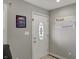 Neutral entryway with a decorative front door and stylish accents at 3940 E 600 N, Columbus, IN 47203