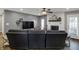 Cozy living room with a fireplace, wood floors, and plenty of seating, perfect for entertaining at 3940 E 600 N, Columbus, IN 47203