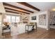 Cozy living room with wooden beams, a fireplace, and ample natural light at 4034 Saddle Club S Pkwy, Bargersville, IN 46106