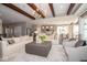 Open living space connecting living, dining, and kitchen with modern decor and ample light at 4034 Saddle Club S Pkwy, Bargersville, IN 46106