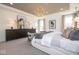 Elegant main bedroom with stylish furniture, tray ceiling, and large windows at 4034 Saddle Club S Pkwy, Bargersville, IN 46106