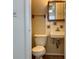 Compact bathroom with a vanity, tile accents, and modern fixtures at 4151 Bowman Ave, Indianapolis, IN 46227