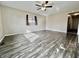 Spacious living room with sleek flooring, natural light, and neutral walls at 4151 Bowman Ave, Indianapolis, IN 46227