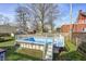 An above-ground backyard pool with a deck surround, providing summer fun in a fenced outdoor space at 420 N Irvington Ave, Indianapolis, IN 46219