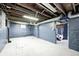 Basement features painted brick walls and open ceiling at 420 N Irvington Ave, Indianapolis, IN 46219