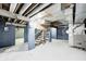 Spacious basement with painted brick walls and open ceiling at 420 N Irvington Ave, Indianapolis, IN 46219