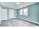 Newly renovated bedroom offers new floors, fresh paint, and plenty of natural light, ready for comfortable living at 420 N Irvington Ave, Indianapolis, IN 46219