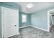 This bedroom features an updated floor and fresh paint to create a stylish and comfortable living space at 420 N Irvington Ave, Indianapolis, IN 46219