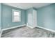 Cozy bedroom with new floors and freshly painted walls, providing a clean and inviting atmosphere at 420 N Irvington Ave, Indianapolis, IN 46219