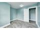 Bedroom featuring hard surface floors, fresh paint, and new door with white trim at 420 N Irvington Ave, Indianapolis, IN 46219