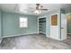 Spacious bedroom with hardwood-style flooring, a window, and a closet at 420 N Irvington Ave, Indianapolis, IN 46219