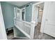 The upper hallway features new flooring and paint, providing access to several bedrooms and a full bathroom at 420 N Irvington Ave, Indianapolis, IN 46219