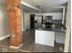 Modern kitchen with stainless steel appliances, white cabinets, and a functional island at 430 Parkway Ave, Indianapolis, IN 46225