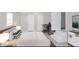 Comfortable bedroom with a work space, stairs to upper level and stylish decor at 430 Parkway Ave, Indianapolis, IN 46225
