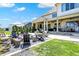 Expansive backyard featuring a fire pit, patio, and lush landscaping, ideal for outdoor living at 5130 Melbourne Pl, Zionsville, IN 46077