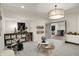 Bright basement area with neutral carpet, featuring a play area and access to another room at 5130 Melbourne Pl, Zionsville, IN 46077
