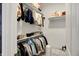 Organized closet featuring shelving, hanging rods, and a variety of clothing and accessories at 5130 Melbourne Pl, Zionsville, IN 46077