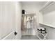 This walk-in closet has built-in shelves and clothing racks for storage at 5130 Melbourne Pl, Zionsville, IN 46077