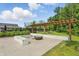 Outdoor common area with seating and a fire pit with a shelter over the seating area at 5130 Melbourne Pl, Zionsville, IN 46077