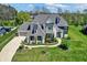 Stunning two-story home with beautiful landscaping and a three-car garage at 5130 Melbourne Pl, Zionsville, IN 46077